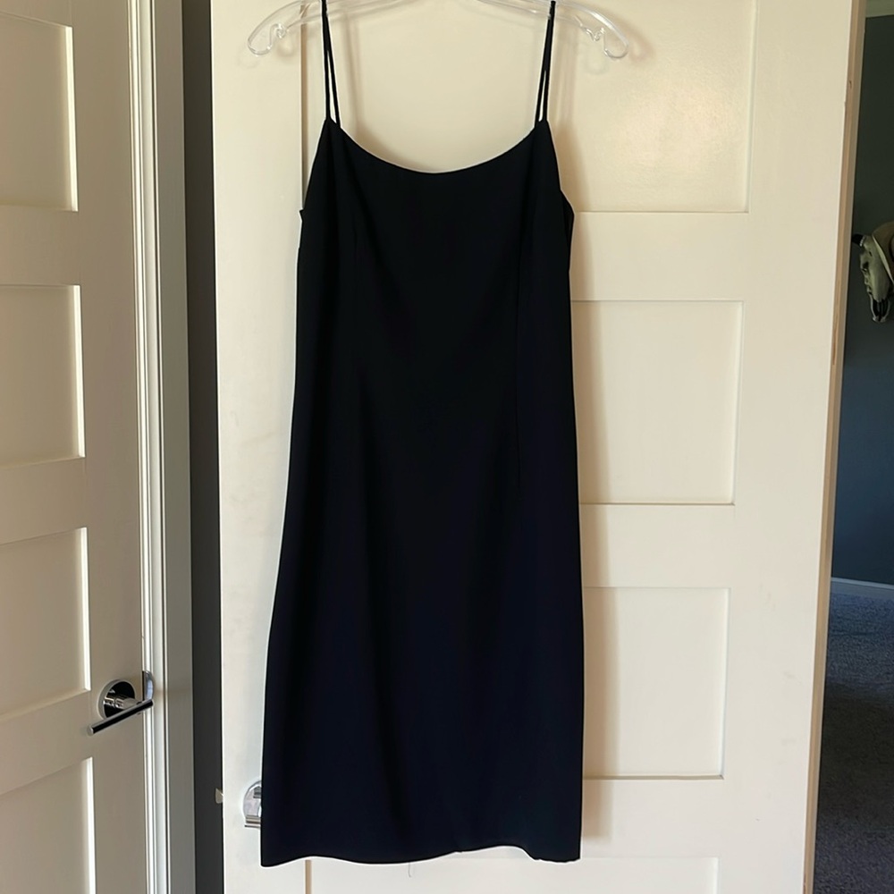Classic, elegant little black dress, knee length, spaghetti straps